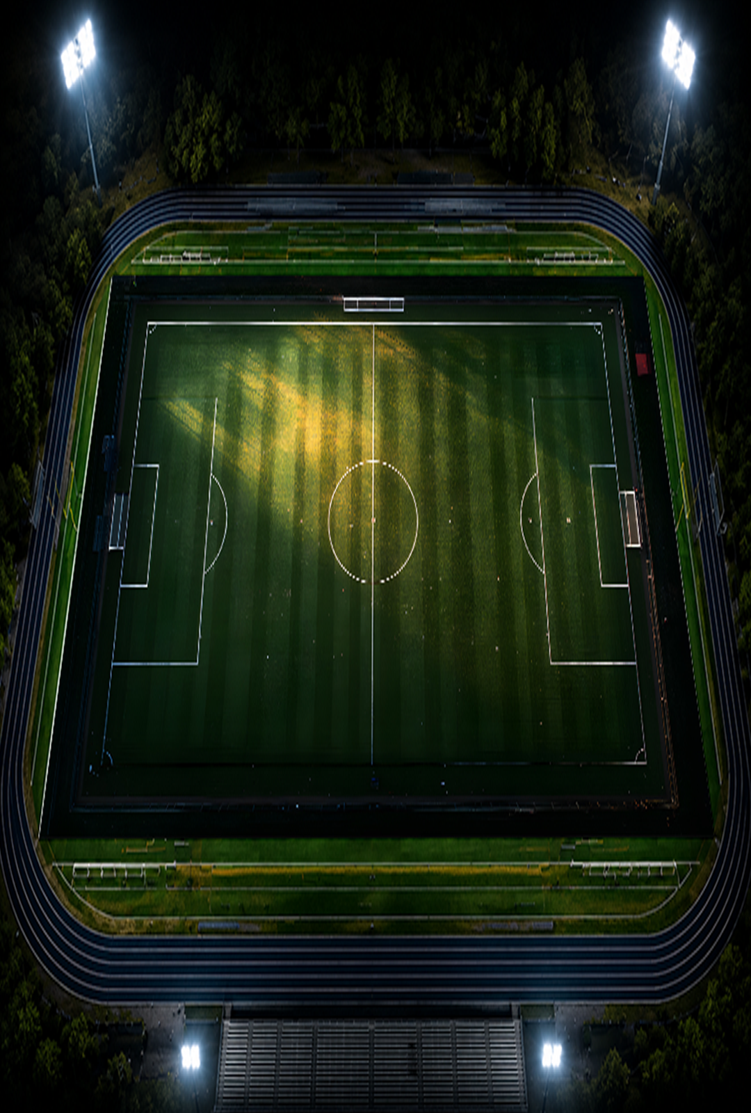 Overhead portrait view of a sports field at night