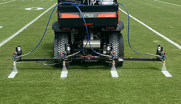 Four-gun hash mark attachment for football fields