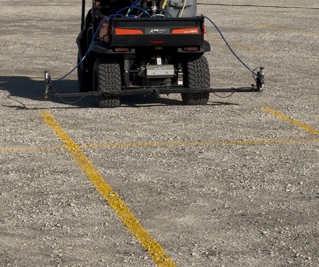 Dual-gun attachment for parking lot striping