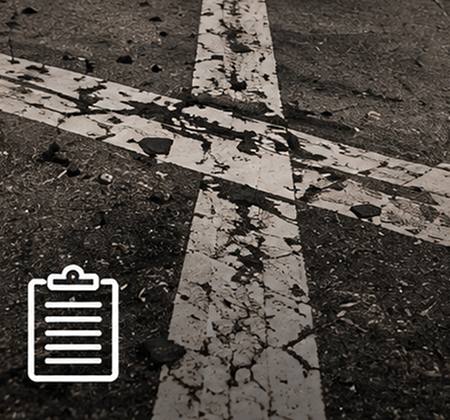 Old pavement markings requiring restriping